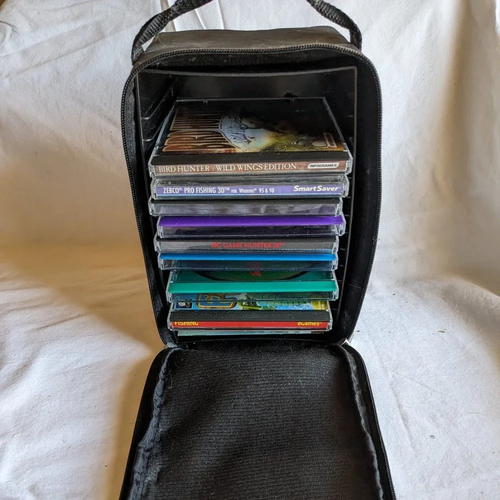 Bundle of 8 PC games and CD Carry Case